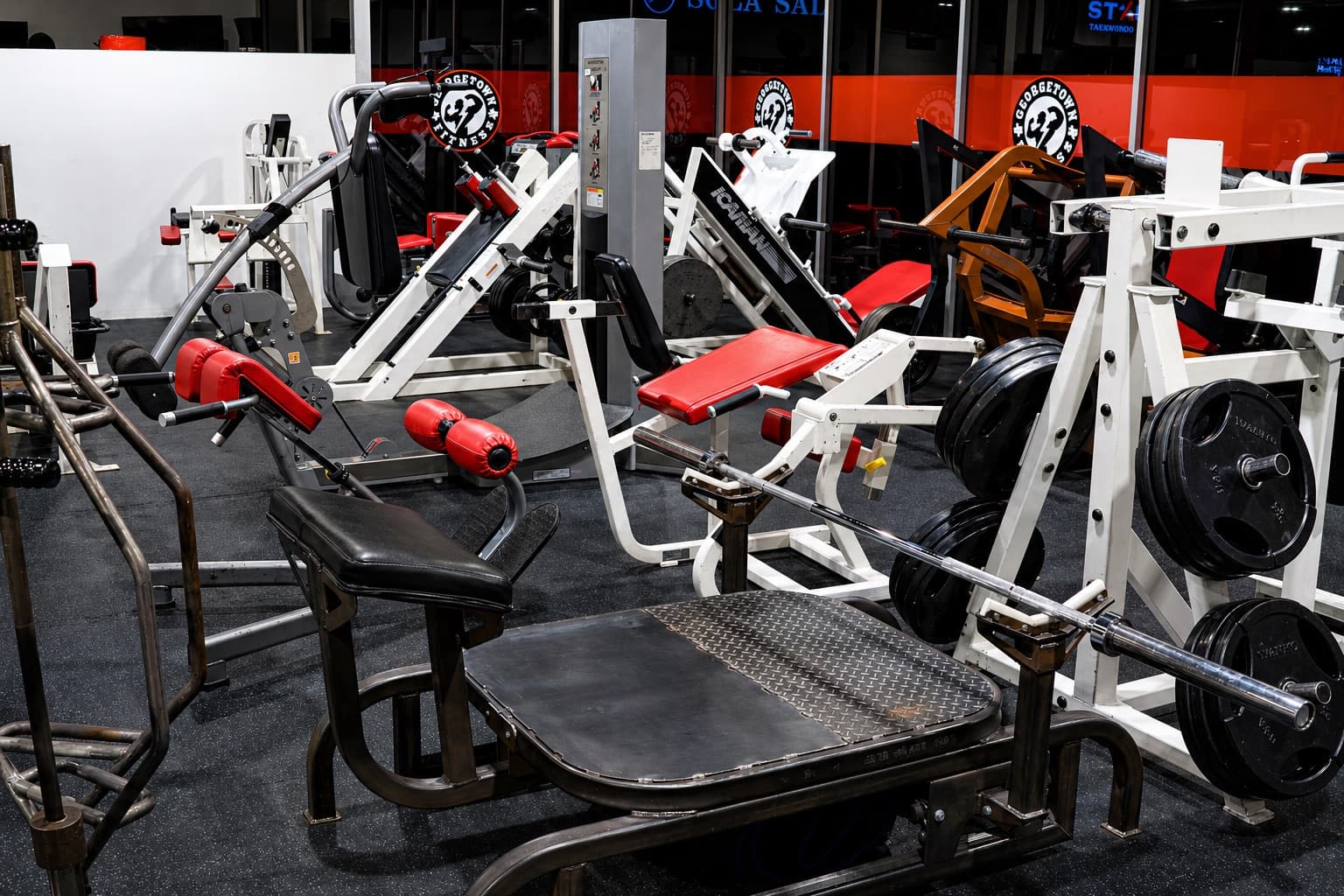 Georgetown Fitness red and white equipment lineup